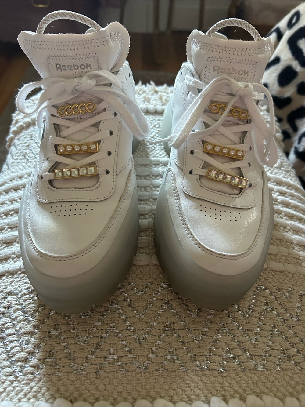 Cardi B x Reebok White Platform Sneakers with Gold Rhinestone Lace Charms